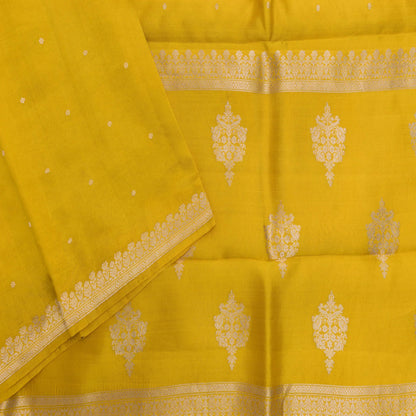 Yellow fabric with white floral patterns and a border