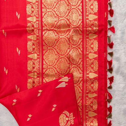Red fabric with gold patterns on a white background
