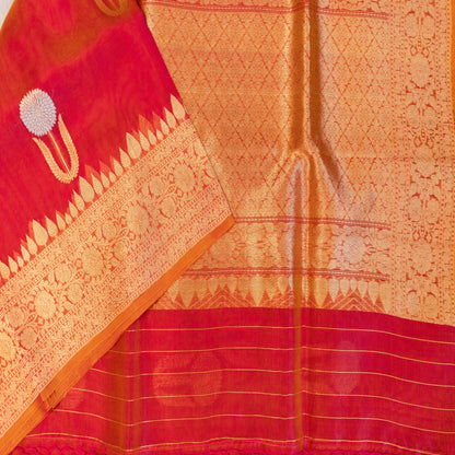 Red and orange saree with intricate patterns