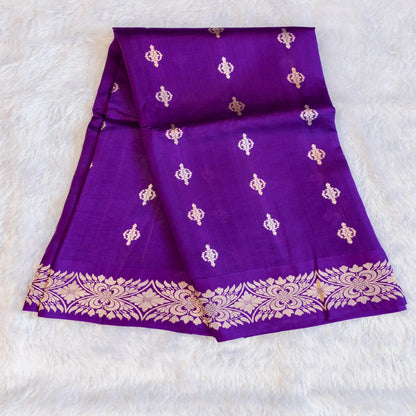 Purple fabric with gold patterns on a white background
