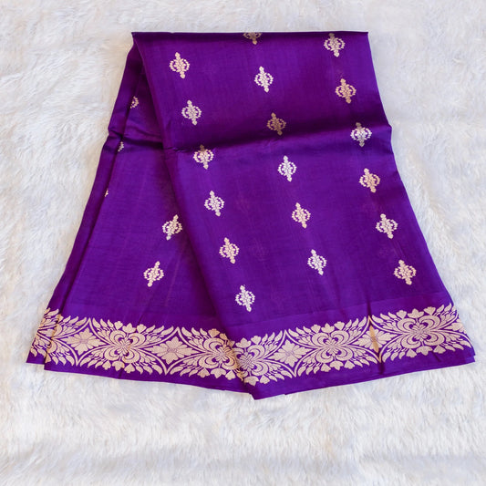 Purple fabric with gold patterns on a white background