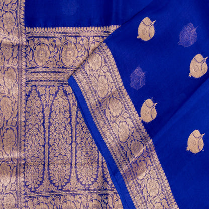 Blue fabric with gold patterns and designs
