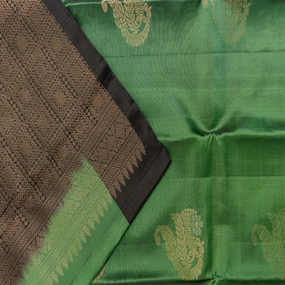 Green fabric with gold patterns and a brown border