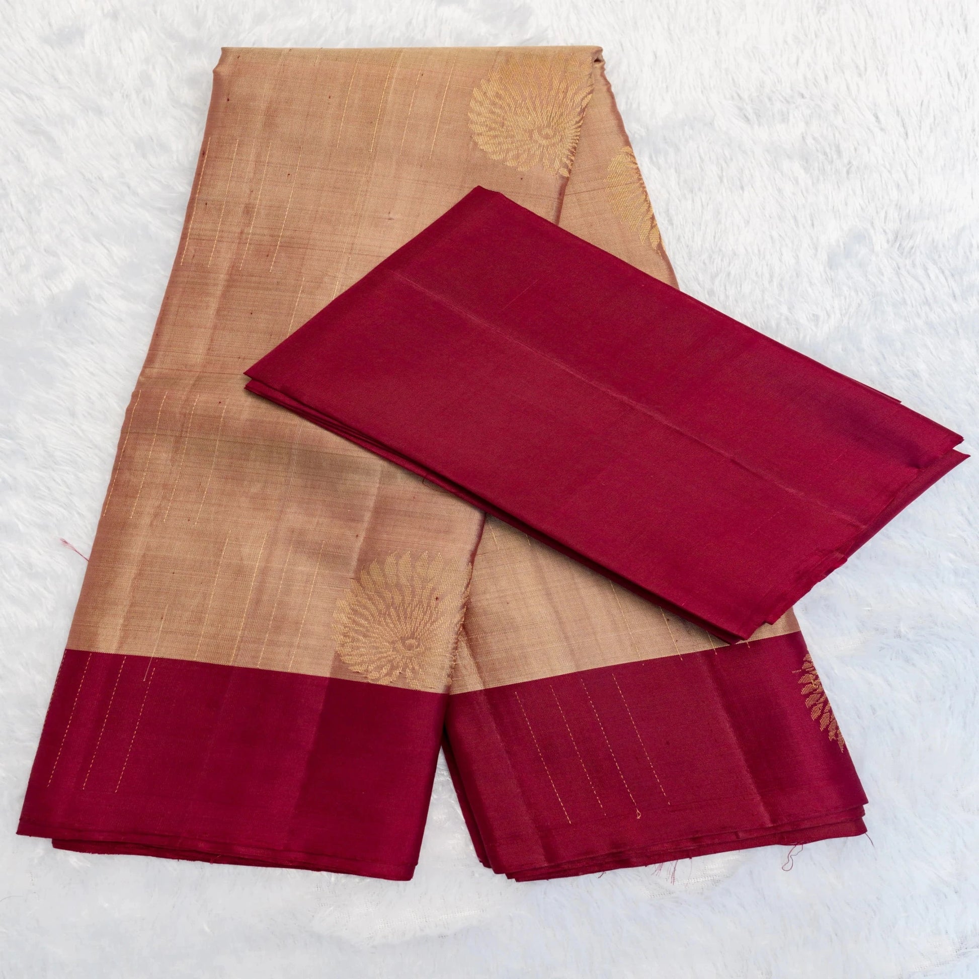 Brown fabric with red borders on a white background
