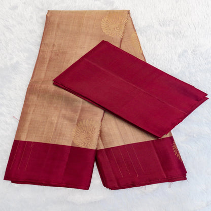 Brown fabric with red borders on a white background