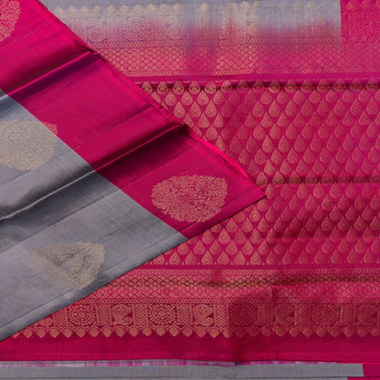 Pink and gray saree with intricate patterns