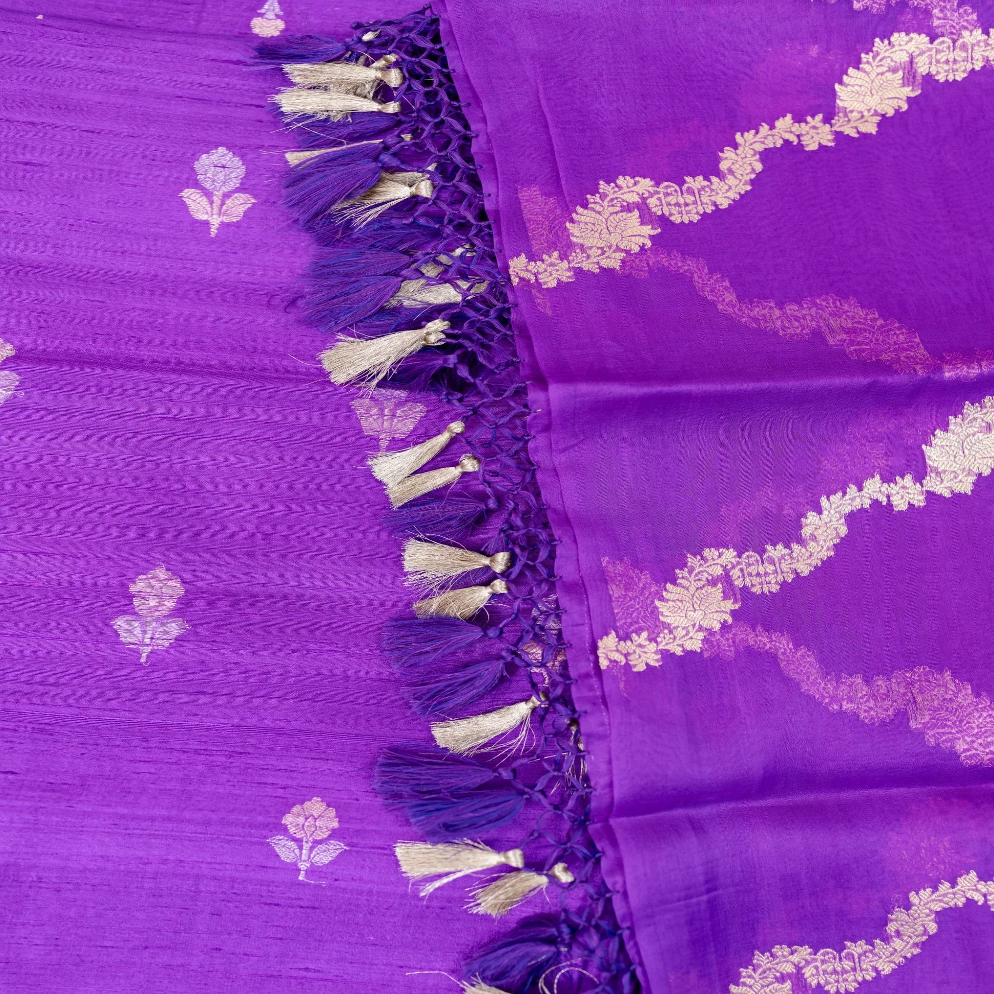 Purple fabric with gold embroidery and tassels