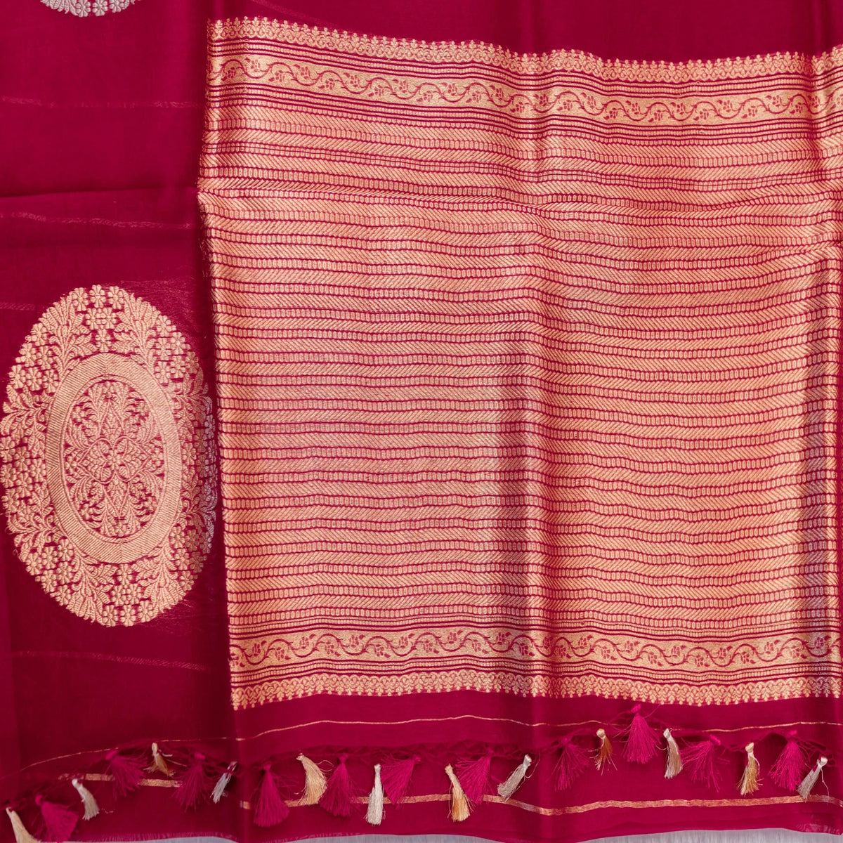 Red saree with gold embroidery and patterns
