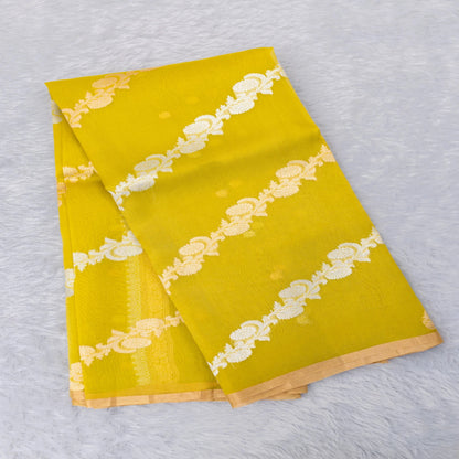 Two yellow napkins with white lace patterns on a light gray background