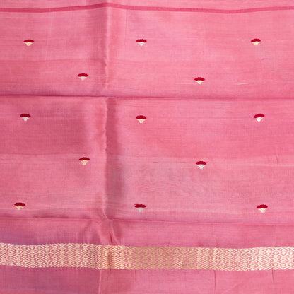 Pink fabric with a subtle pattern and border
